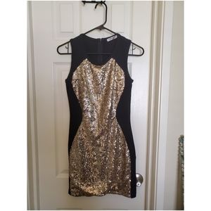 Black & gold Xtaren dress